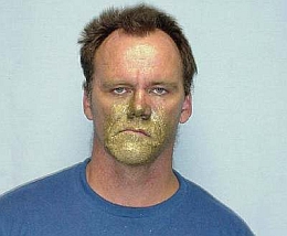 gold-paint-face-guy.jpg