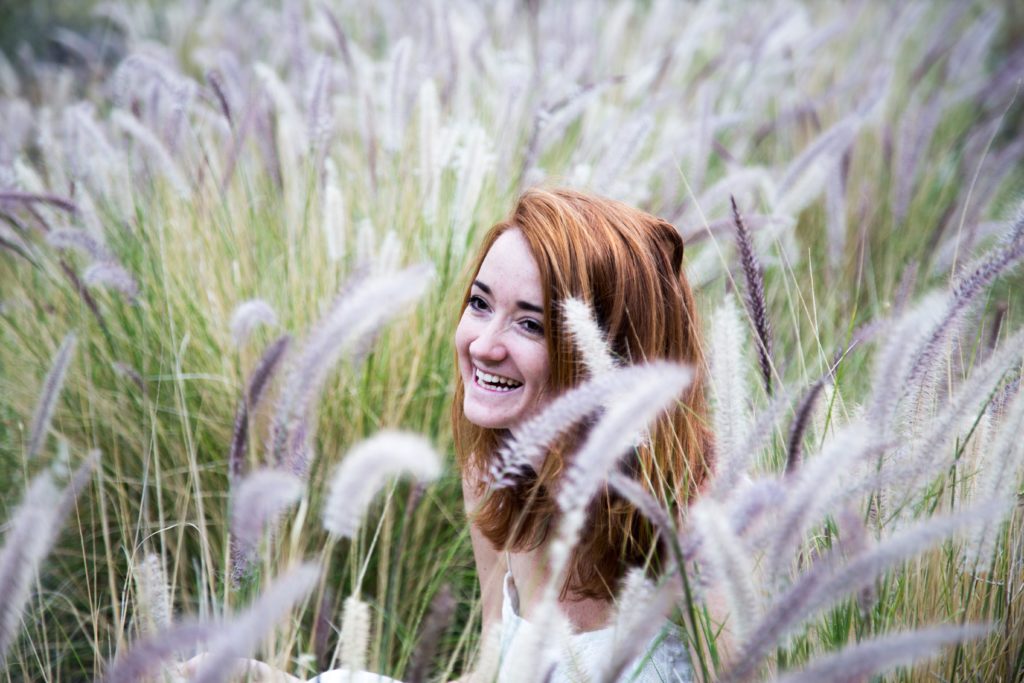loricalabresemd-red-haired-girl-in-a-field-blake-hunter-223005-unsplash-1-1024x683.jpg