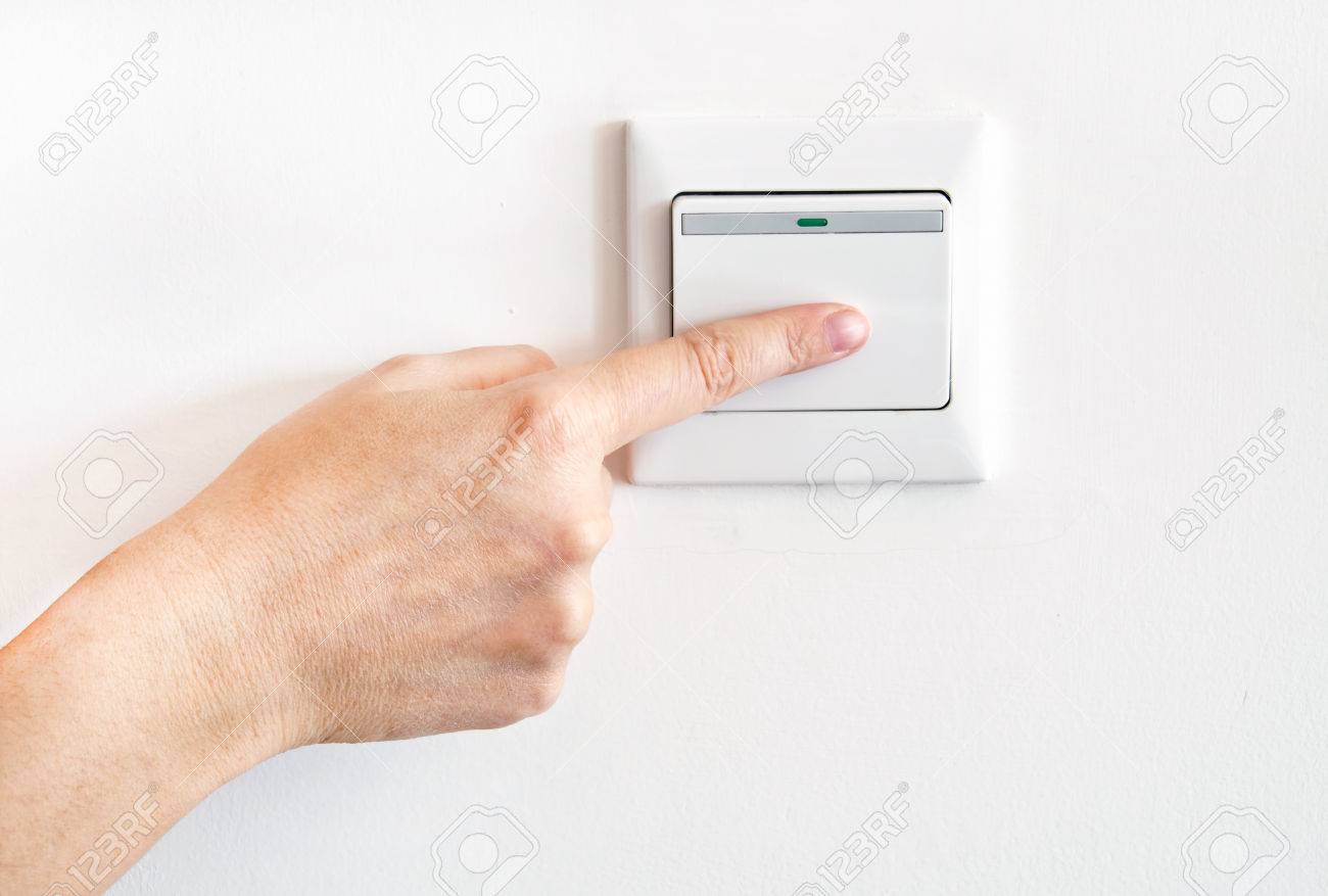 38931269-hand-with-finger-on-light-switch.jpg
