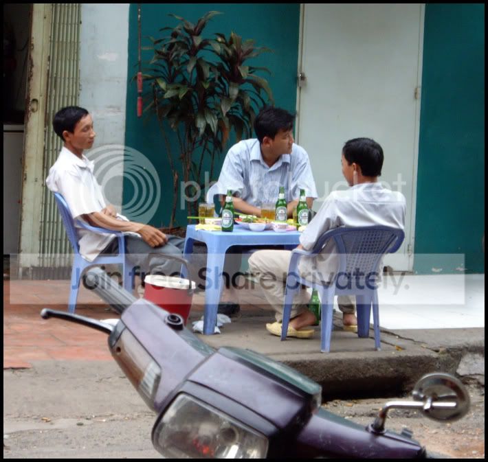 Saigon-mensittingfromFrankiesbar.jpg