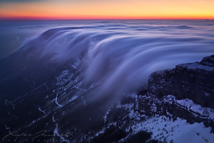 Surfing_over_the_clouds_by_XavierJamonet.jpg