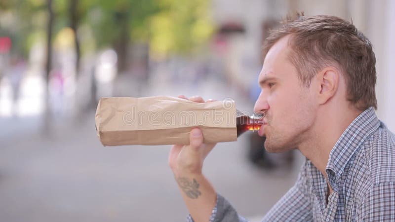 slovenly-man-drinking-alcohol-street-beer-paper-bag-concept-addiction-social-discrimination-78483688.jpg