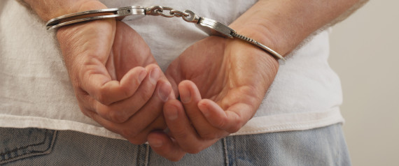 n-PERSON-IN-HANDCUFFS-large570.jpg