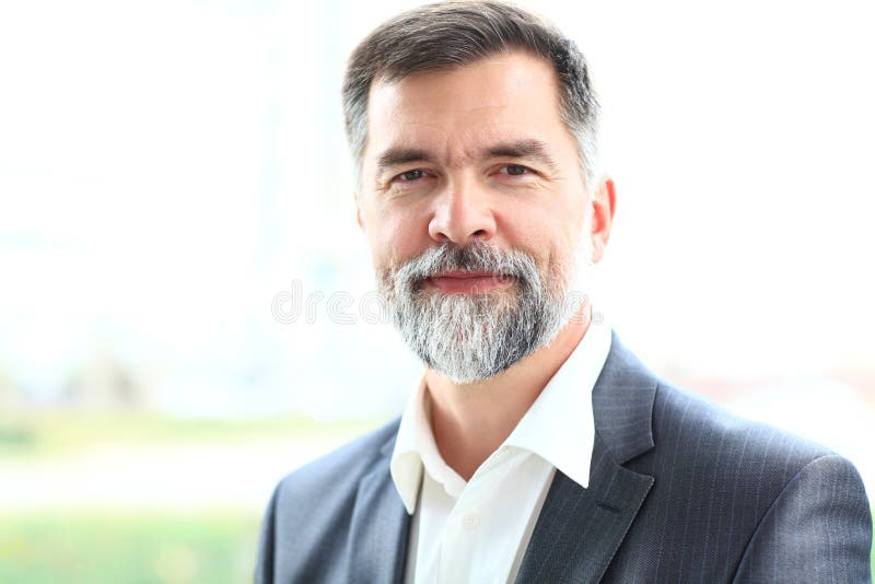happy-senior-business-man-smiling-portrait-45140025.jpg